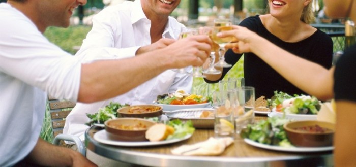 Friends Toasting --- Image by © ImageShop/Corbis