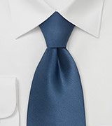 blue solid colored tie