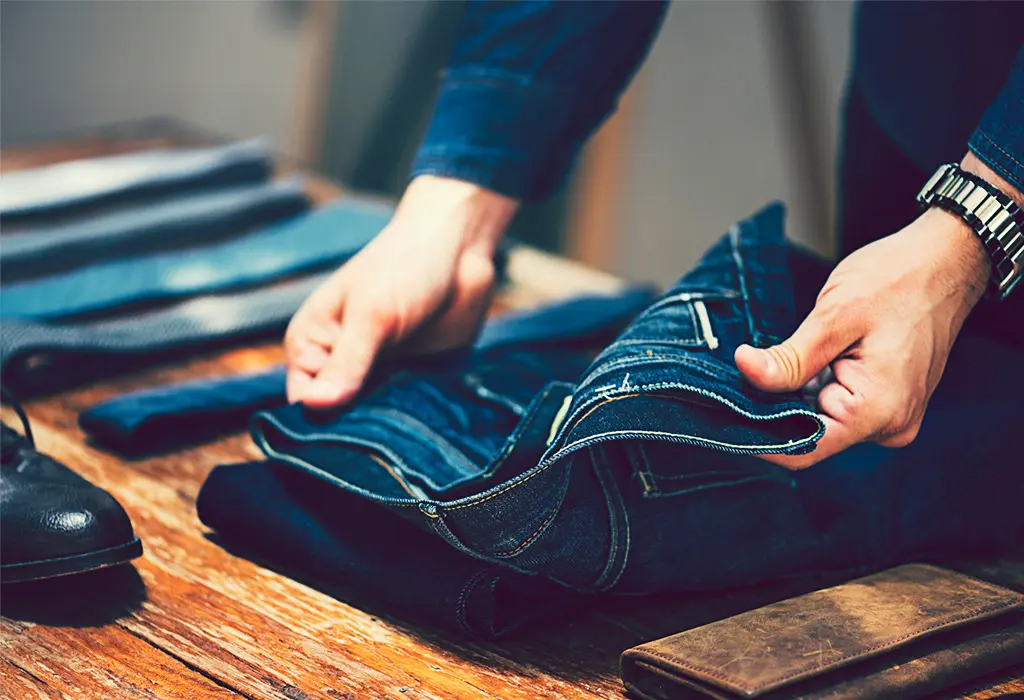 man choosing right jeans fit