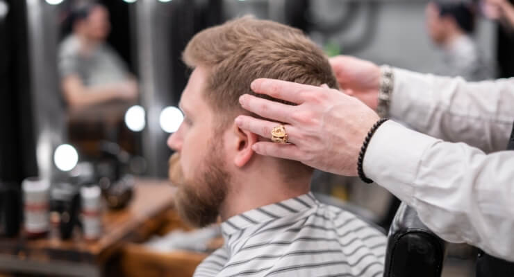 man getting a good cut of the back of his head