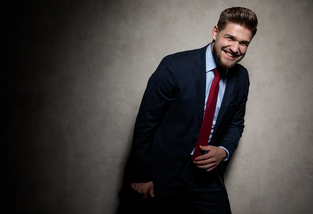 Man in suit with smile knows how to look young