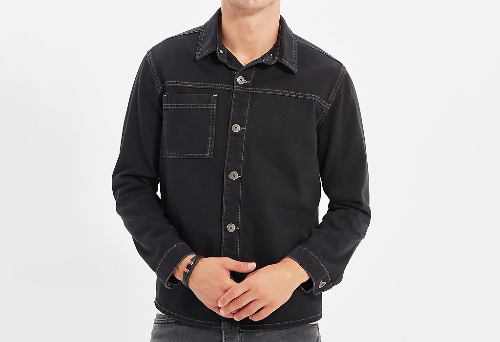 man wearing dark denim buttoned overshirt