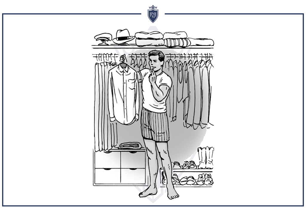 man choosing clothes in his wardrobe