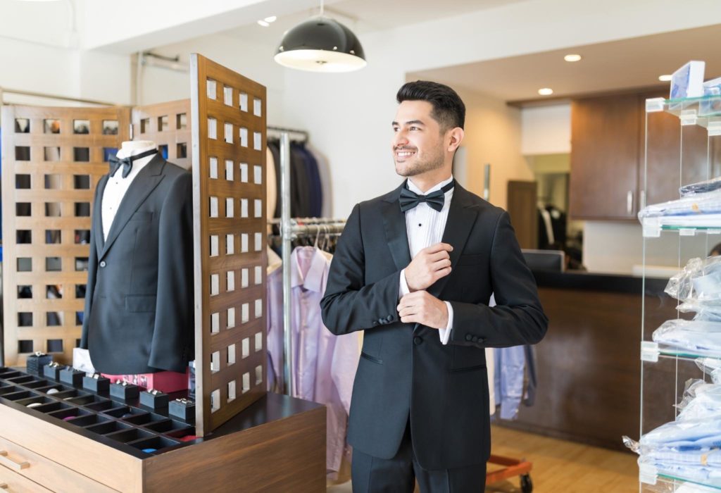 man renting tuxedo for wedding - difference between tuxedo and suit