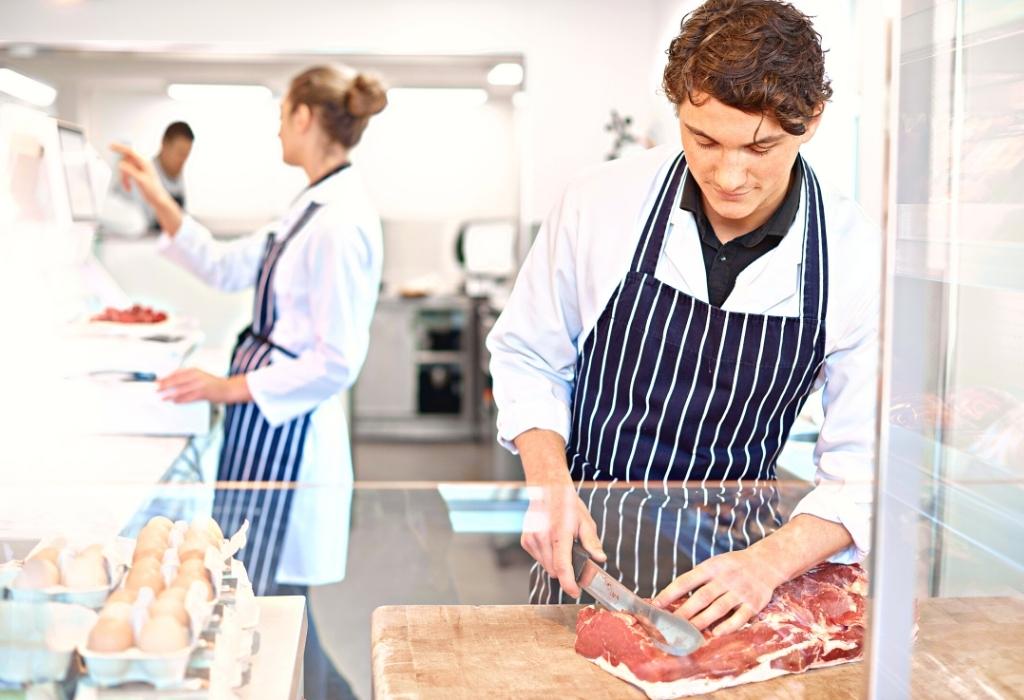 butcher cutting meat - summer dinner ideas