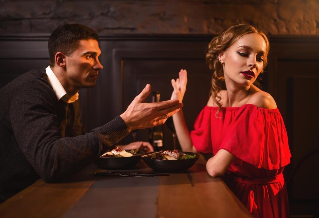 woman turned off by angry looking man - first date mood killer