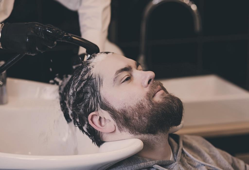 guy gets hair washed
