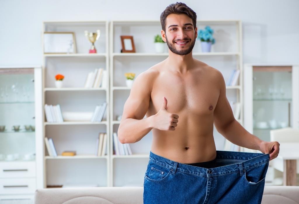 man happy after losing weight