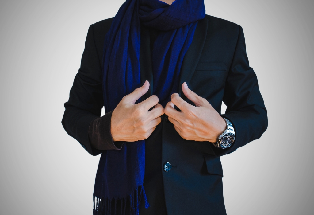man in suit and scarf