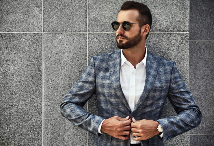 portrait-handsome-fashion-businessman-model-dressed-elegant-checkered-suit