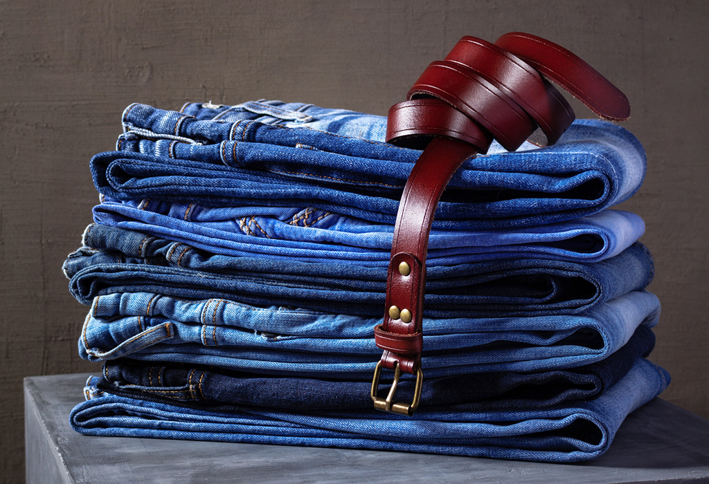 belt with stack of jeans ready to wear for a casual event